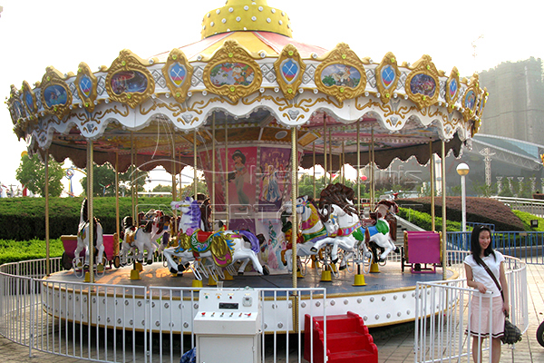 Dinis child coin operated carousel ride