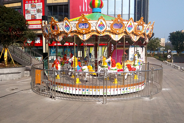 Dinis small coin operate carousel