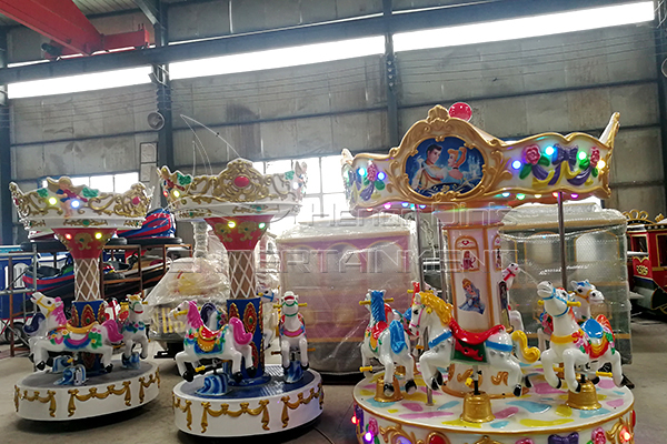 coin operated 3 horse carousel is available in Dinis