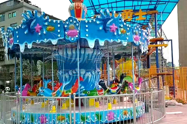 fair merry go round ocean themed kiddie is available in Dinis